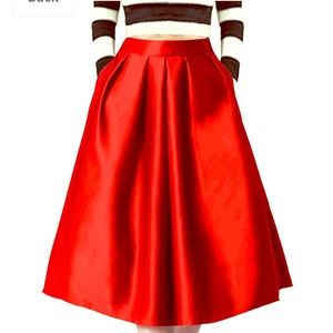 High waisted red pleated skirt with pockets